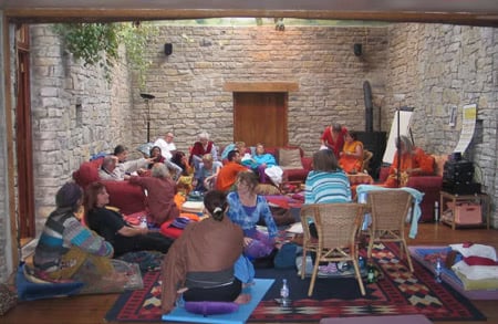 Historic mantra workshop archive photo showing tradition-sharing within a community learning environment.