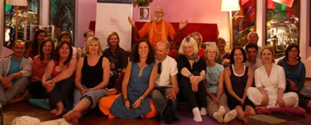 Archive photo documenting workshop participants engaged in collaborative spiritual learning and practice.